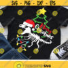 Christmas Dinosaur Svg Santa T Rex Svg Funny Dino Cut Files Merry Christmas Clipart Kids Holiday Svg Dxf Eps Png Silhouette Cricut Design 3215 .jpg