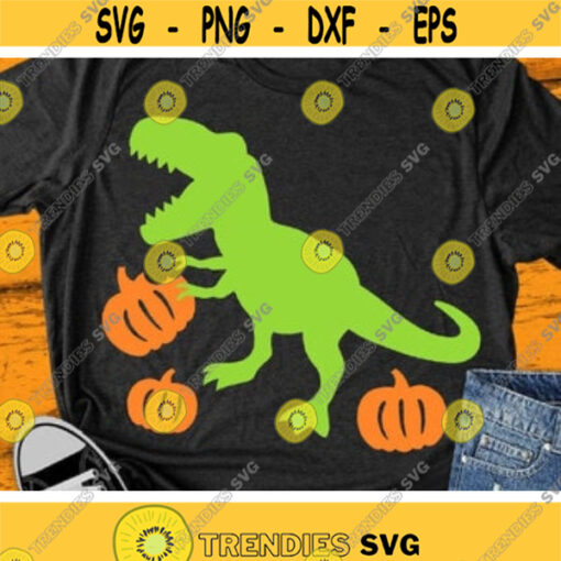 Dinosaur with Pumpkin Svg Fall T Rex Svg Dxf Eps Png Thanksgiving Cut Files Halloween Kids Shirt Svg Autumn Clipart Silhouette Cricut Design 794 .jpg